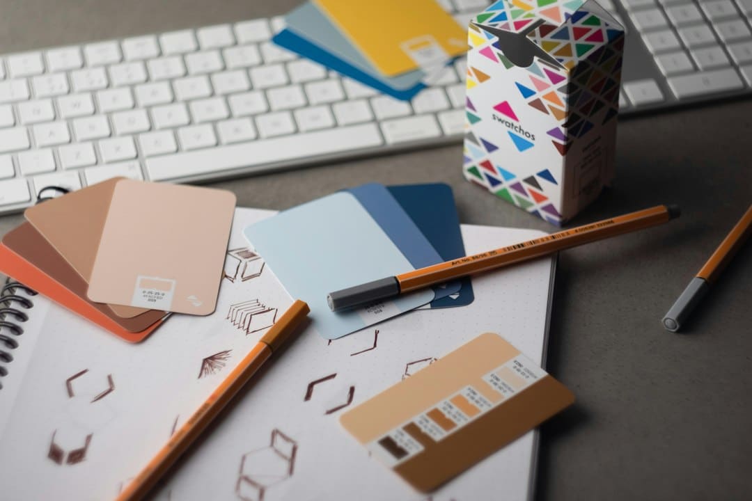 Creative workspace with colour swatches for developing a cohesive visual identity